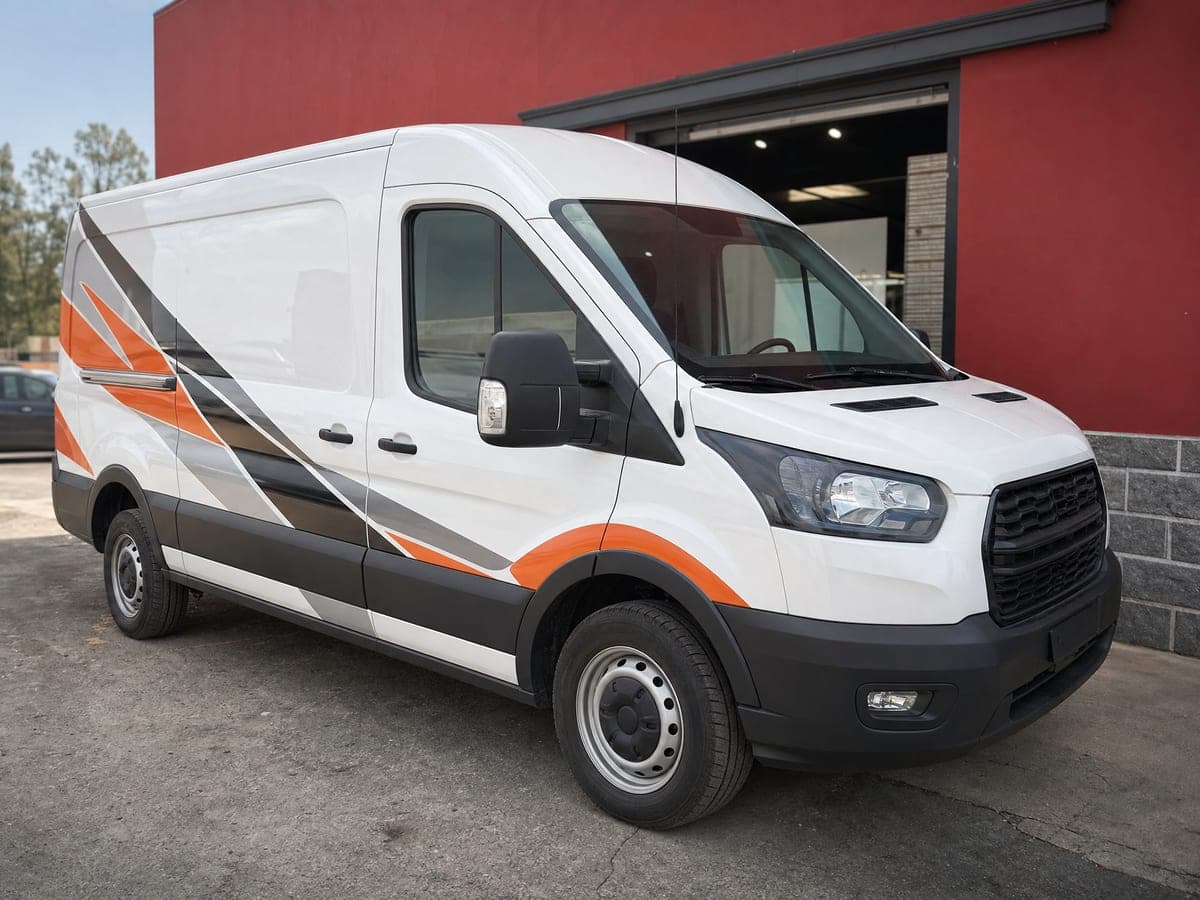Work van with fresh custom vinyl graphics and striping